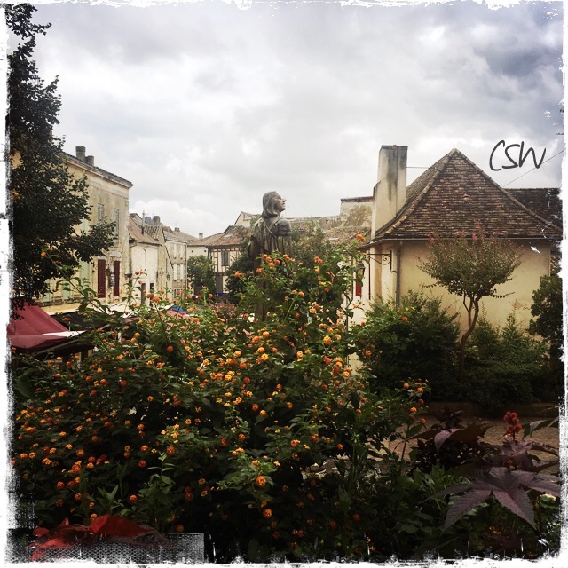 Cyrano de Bergerac lurking above the bushes.