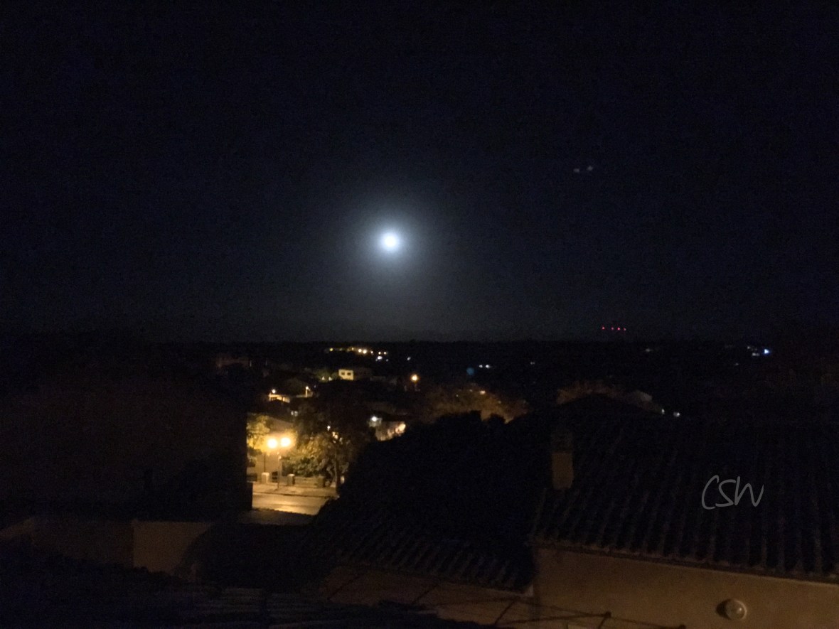 View from my bed in Valensole with the moon lurking through the window.
